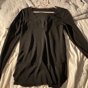 Black top. Great condition. Semi see-through. Loose fit